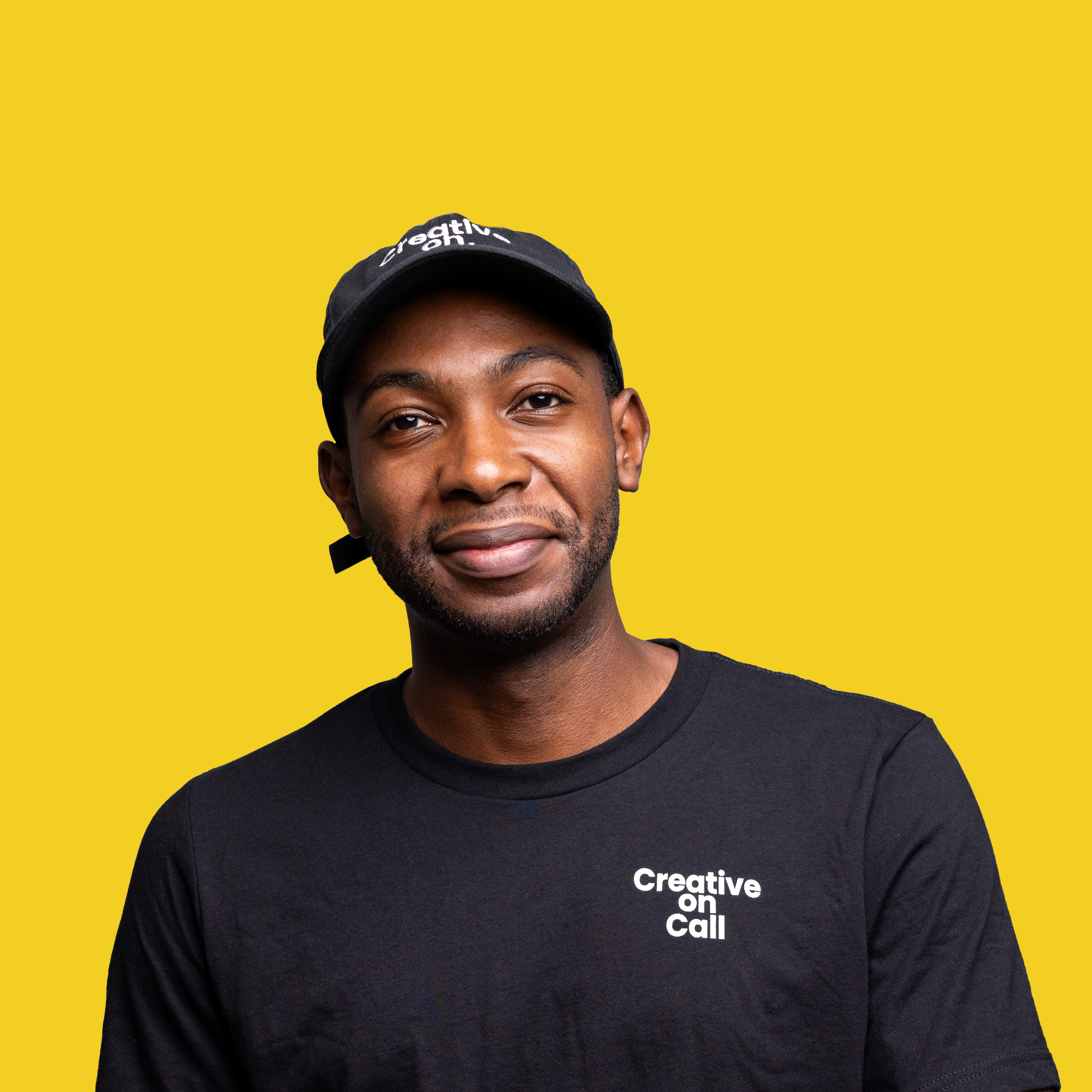 TJ, founder of TJ Creative Services, camera in hand